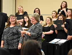 Longtime music director honored at Northeast's spring concert
